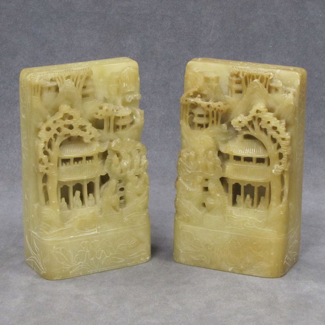 PAIR CHINESE CARVED SOAPSTONE BOOKENDS: PAIR CHINESE CARVED SOAPSTONE BOOKENDS, 19/20TH CENTURY. HEIGHT 7"