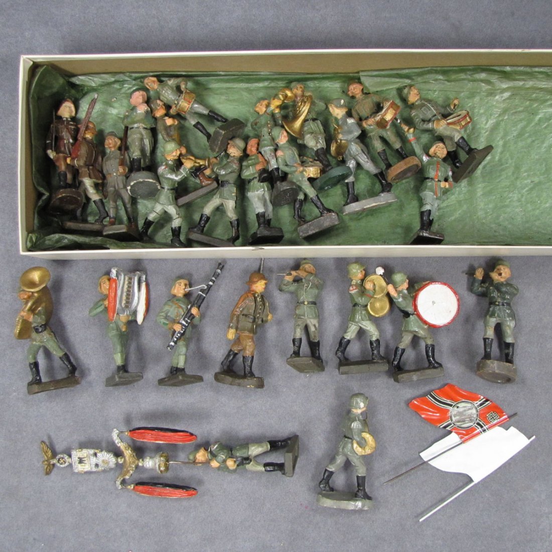 LOT ASSORTED ELASTOLIN, LINEOL AND DURA BAND: LOT ASSORTED ELASTOLIN, LINEOL AND DURA PAINTED GERMAN WWII MARCHING BAND. HEIGHT 3"
