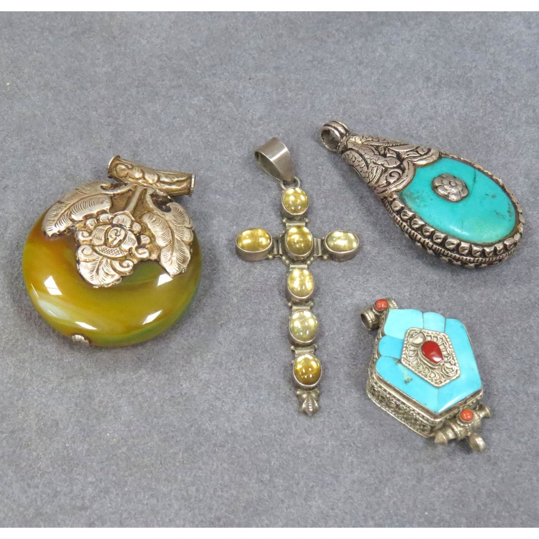 LOT (4) TIBETAN SILVER AND GEM STONE PENDANTS: LOT (4) TIBETAN SILVER, TURQUOISE, AGATE, AND CITRINE PENDANTS. LENGTH 1 3/4-3"