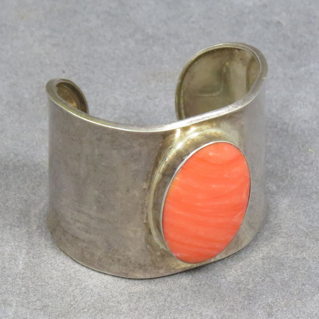 MEXICAN 925 SILVER CUFF BRACELET WITH FAUX CORAL: MEXICAN 925 SILVER CUFF BRACELET WITH FAUX CORAL STONE. WIDTH 2 1/2"; GROSS WEIGHT 1.75 OZT