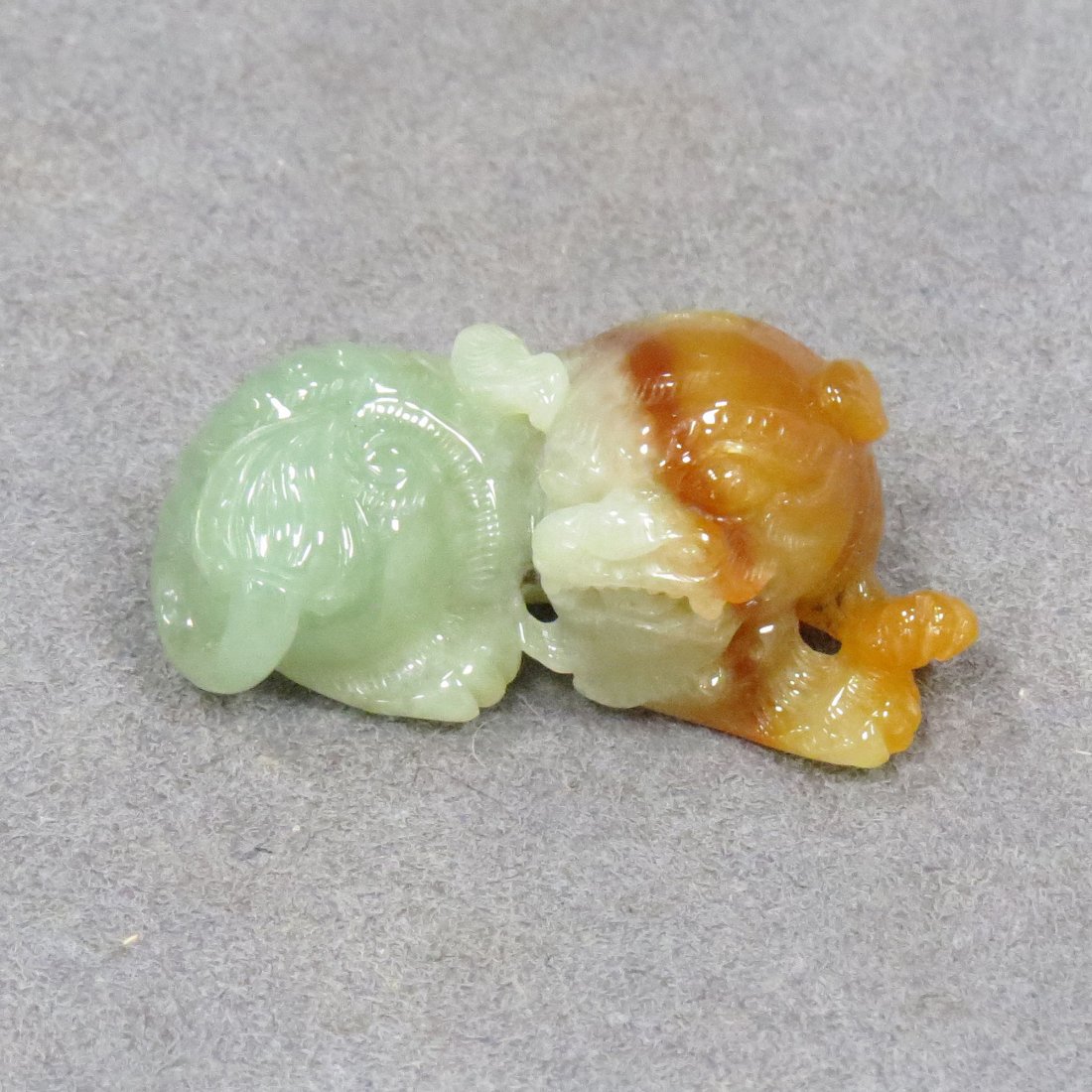 CHINESE CARVED NEPHRITE JADE FOO DOG: CHINESE CARVED NEPHRITE JADE FOO DOG. LENGTH 2"