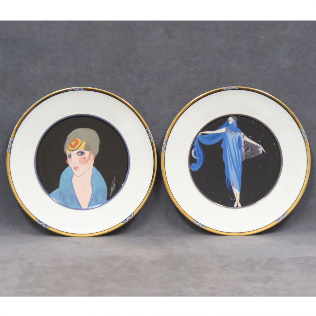 LOT (2) ERTE DESIGN PORCELAIN DECORATED CHARGERS: LOT (2) ERTE DESIGN PORCELAIN DECORATED CHARGERS INCLUDING "MOONLIGHT" AND " YELLOW TURBAN". DIAMETER 12 1/2"