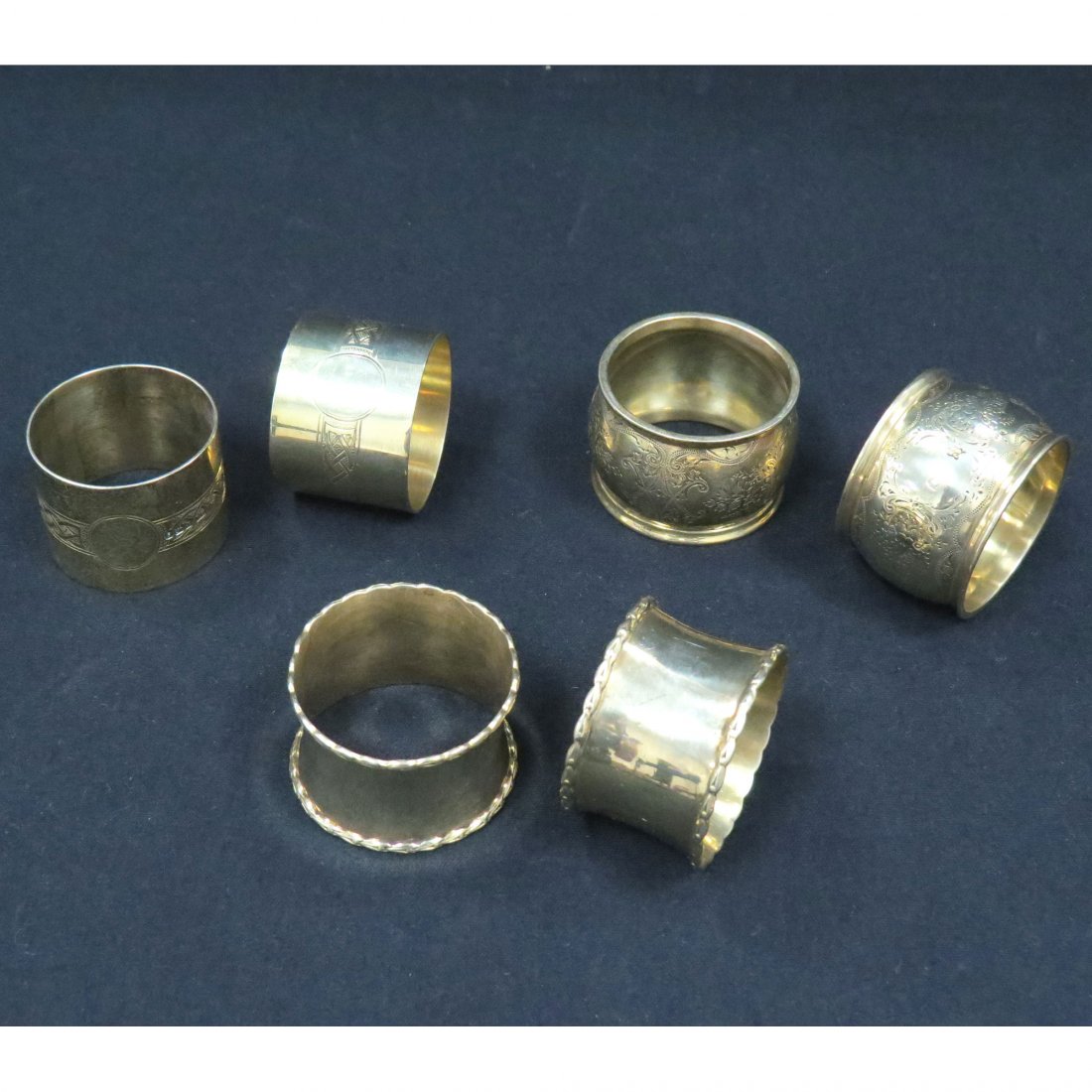 LOT (3) PAIRS GILT STERLING NAPKIN RINGS: LOT (3) PAIRS GILT STERLING NAPKIN RINGS INCLUDING LONDON 1905; BIRMINGHAM 1914; AND SHEFFIELD 1924. TWT 6.25 OZT
