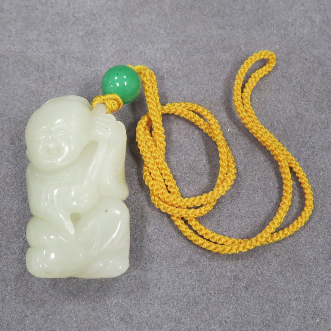CHINESE CARVED JADE TOGGLE, YOUNG BOY : CHINESE CARVED JADE TOGGLE, YOUNG BOY. HEIGHT 2 1/4"