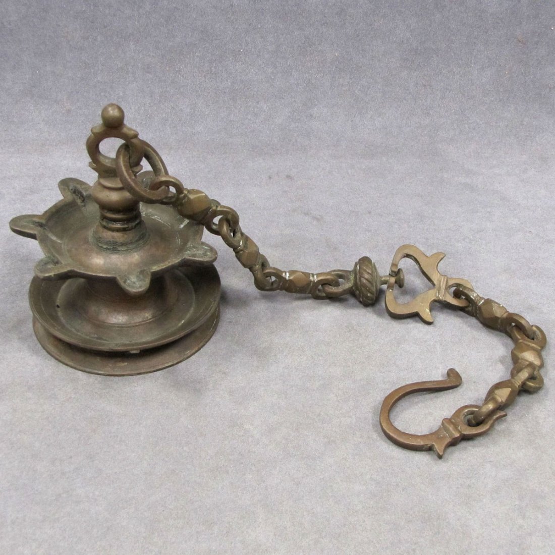 MIDDLE EASTERN BRONZE HANGING FLUID LAMP: MIDDLE EASTERN BRONZE HANGING FLUID LAMP. HEIGHT 23"