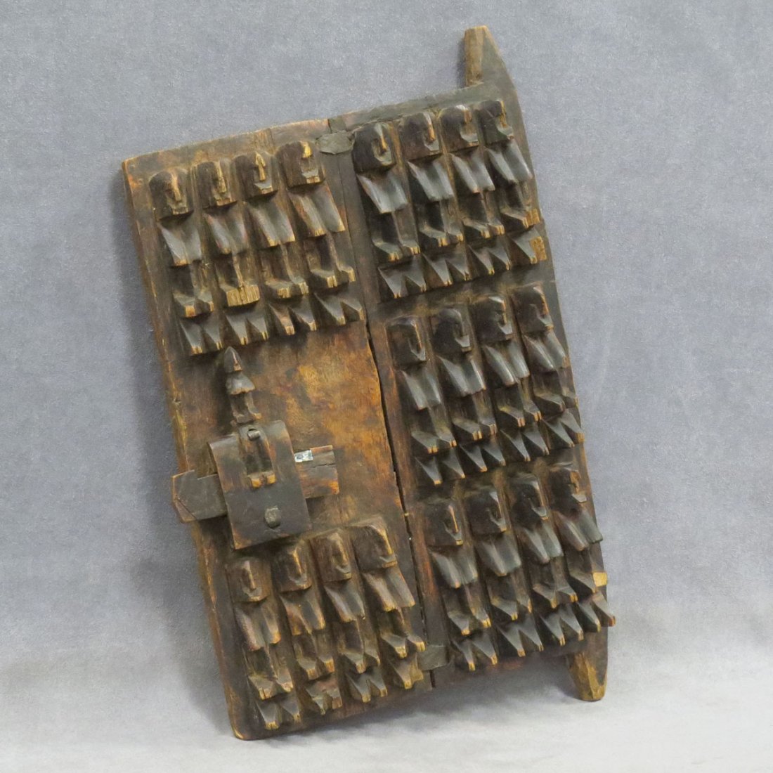 DOGON, MALI CARVED GRANARY DOOR WITH LOCK : DOGON, MALI CARVED GRANARY DOOR WITH LOCK. HEIGHT 17"; WIDTH 10 1/2"