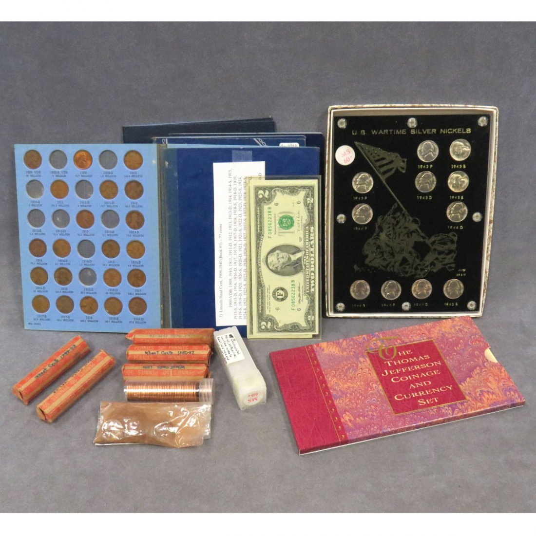 LOT INCLUDING US WARTIME SILVER NICKEL SET: LOT INCLUDING US WARTIME SILVER NICKEL SET, 1942-45 (MS-60); (38) LOOSE WAR TIME NICKELS (MS-60); THOMAS JEFFERSON COINAGE AND CURRENCY SET; (2) JEFFERSON $2.00 NOTES (UNC); (4) WHITMAN BOOKS ASSORTED