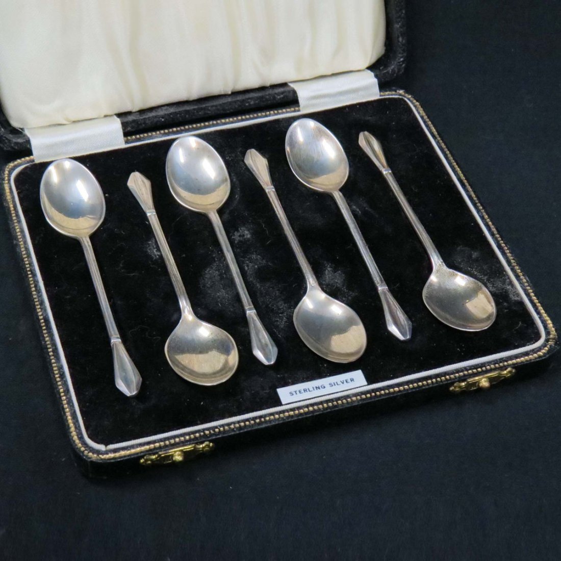 SET (6) ENGLISH BIRMINGHAM STERLING DEMI-TASSE: SET (6) ENGLISH BIRMINGHAM STERLING DEMI-TASSE SPOONS, 1940 CASED. LENGTH 3 1/2"; 1.28 OZT