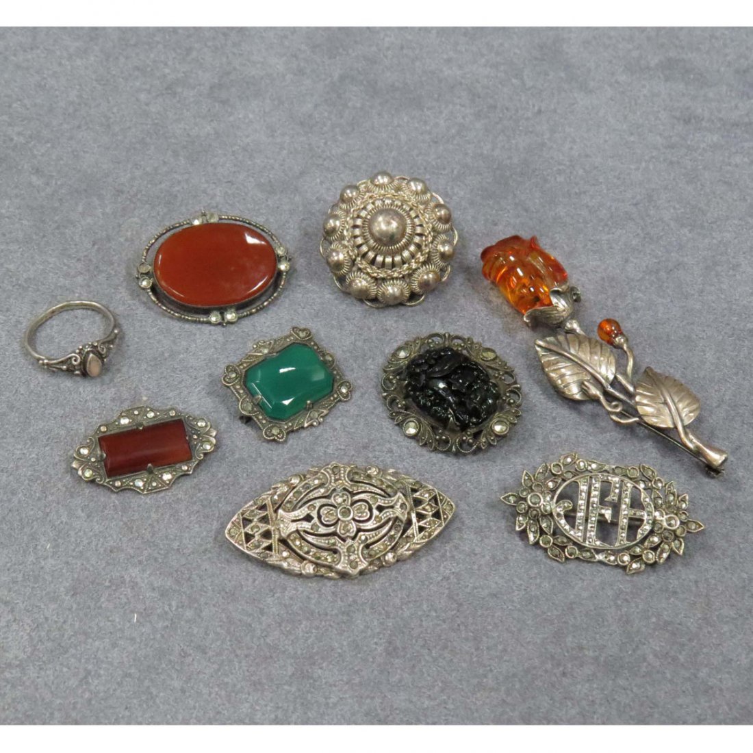 LOT (9) VINTAGE STERLING & MARCASITE BROOCH/PINS: LOT (9) VINTAGE STERLING & MARCASITE BROOCH/PINS AND FRIENDSHIP RING. RING SIZE 5 1/2