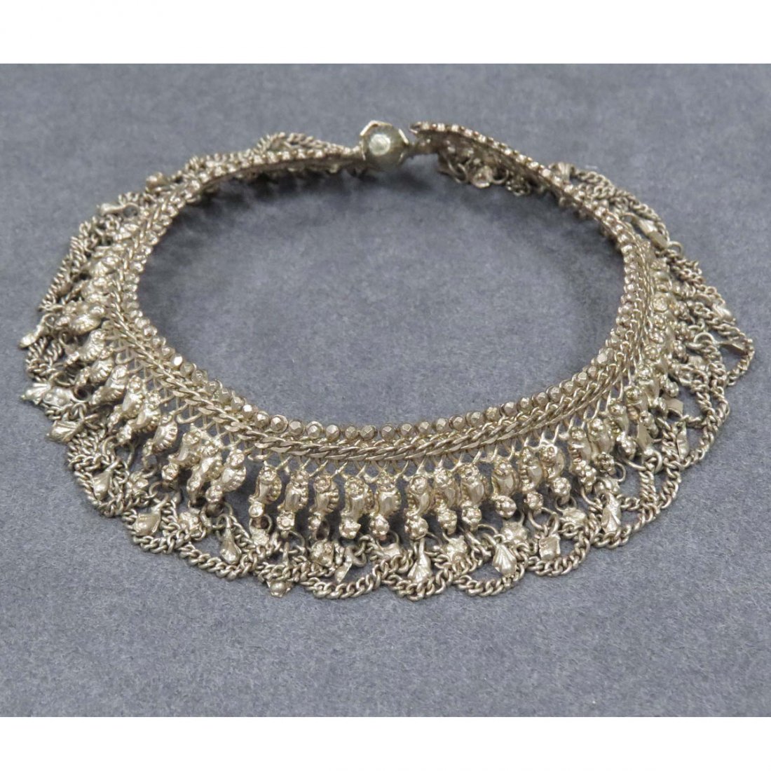 MIDDLE EASTERN SILVER ANKLE BRACELET: MIDDLE EASTERN SILVER ANKLE BRACELET. LENGTH 10 1/2"; 2.57 OZT