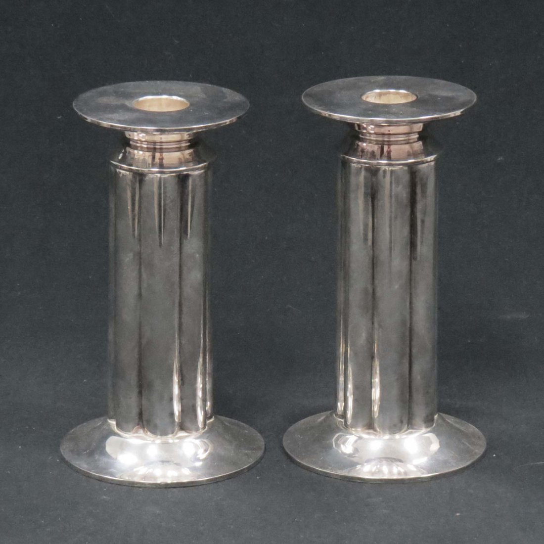 SWID POWELL, PAIR SILVER PLATE CANDLESTICKS, SIGNE: SWID POWELL, PAIR SILVER PLATE CANDLESTICKS, SIGNED. HEIGHT 6 ¼”