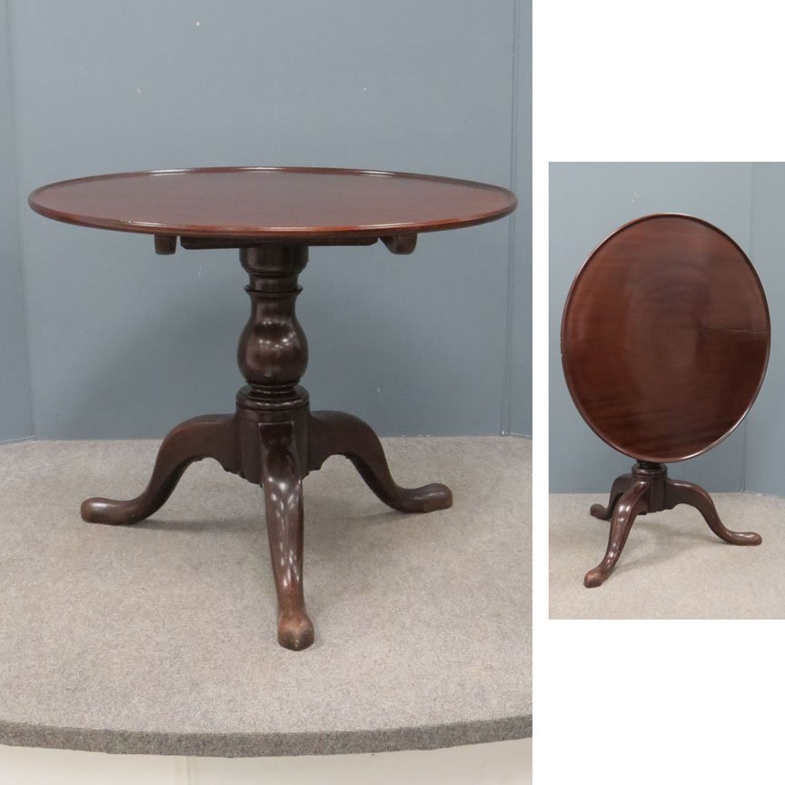 CHIPPENDALE CARVED MAHOGANY TILTING TOP TEA TABLE: CHIPPENDALE CARVED MAHOGANY TILTING TOP TEA TABLE, C.1780. HEIGHT 29"; DIAMETER 36"