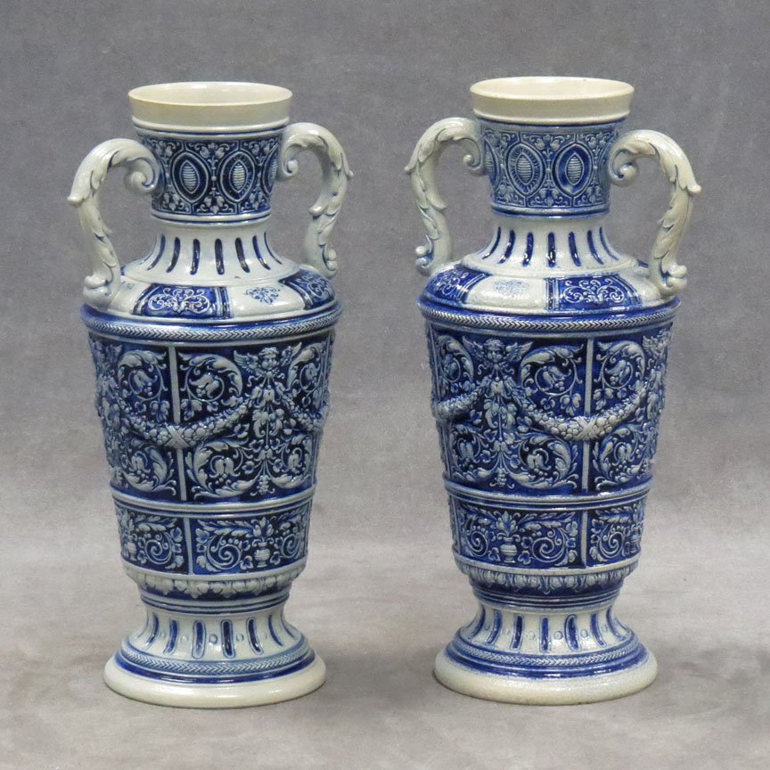 PAIR SIMON PETER GERZ GERMAN STONEWARE VASES: PAIR SIMON PETER GERZ GERMAN STONEWARE DOUBLE HANDLED VASES, SIGNED. HEIGHT 10"