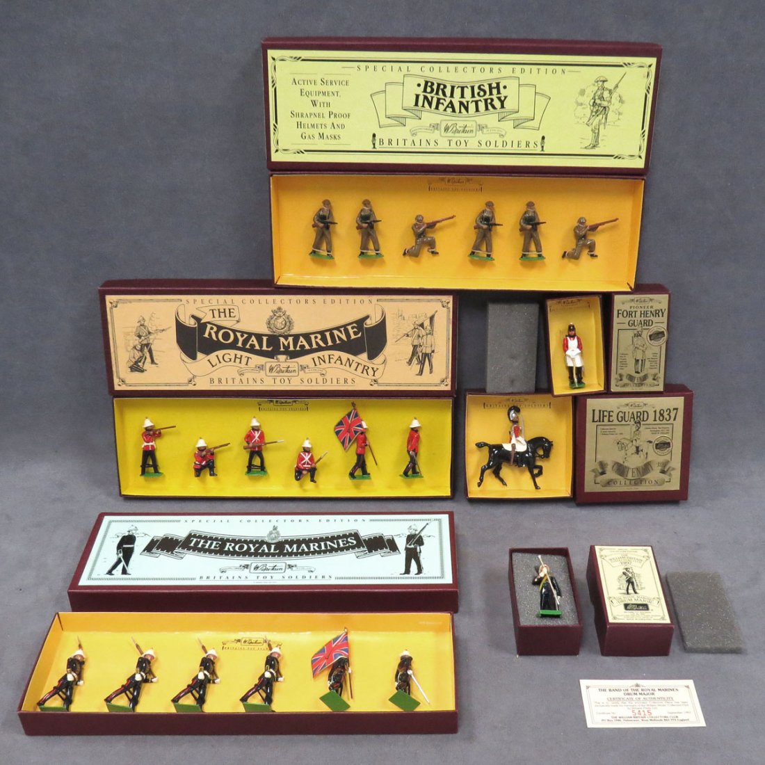 LOT (6) BRITAIN'S TOY SOLDIERS: LOT (6) BRITAIN'S TOY SOLDIERS INCLUDING 8803, 8808, 8855, 8824, ROYAL MARINES DRUM MAJOR, 8823 (NIB)