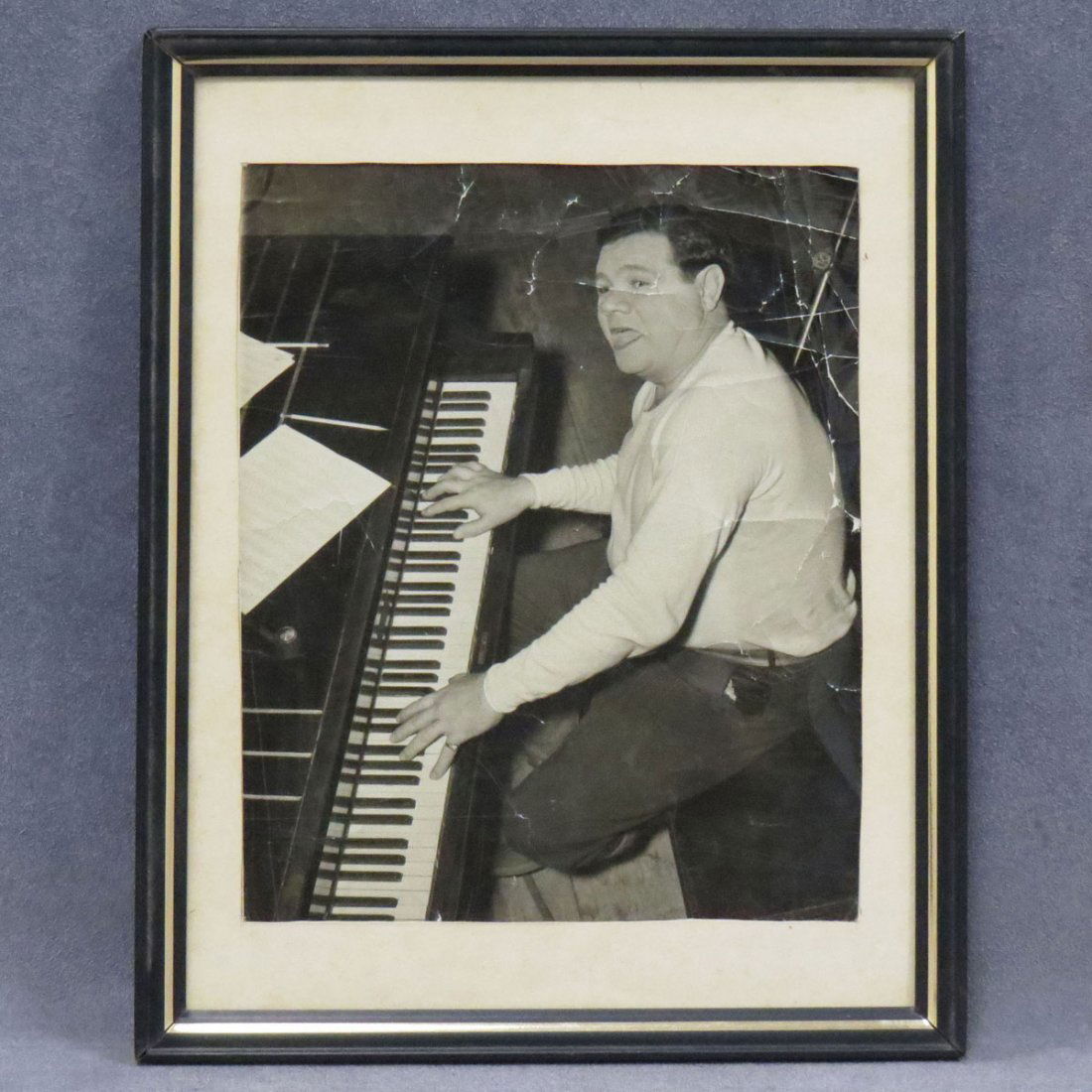 VINTAGE AP PHOTOGRAPH, BABE RUTH: VINTAGE AP PHOTOGRAPH, BABE RUTH, KIDDIN ON THE KEYS, NOV. 19, 1936 (LABELED). FRAMED AND GLAZED-11 X 8 3/4"