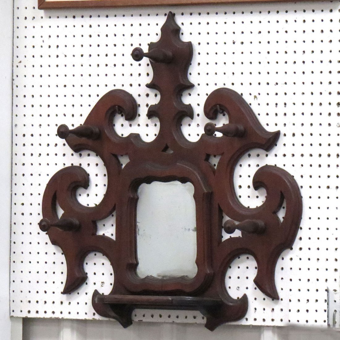 VICTORIAN CARVED WALNUT HAT RACK AND MIRROR: VICTORIAN CARVED WALNUT HAT RACK AND MIRROR. HEIGHT 32"; WIDTH 31"