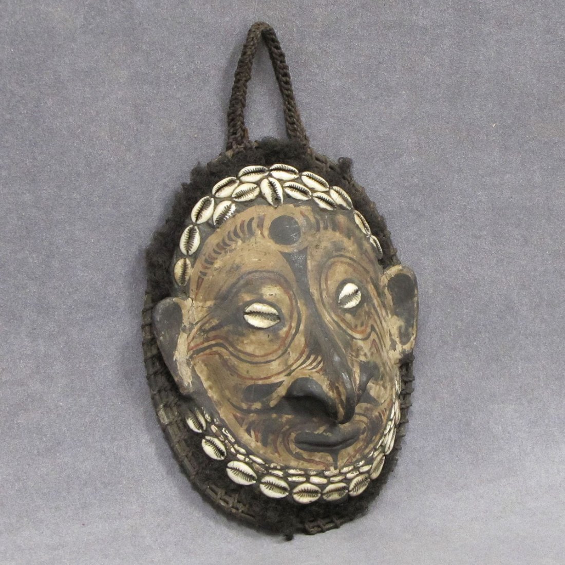VINTAGE SEPIK RIVER (NEW GUINEA) TURTLE SHELL: VINTAGE SEPIK RIVER (NEW GUINEA) TURTLE SHELL, SHELL INLAID AND POLYCHROMED MAST. HEIGHT 9" **CANNOT EXPORT**