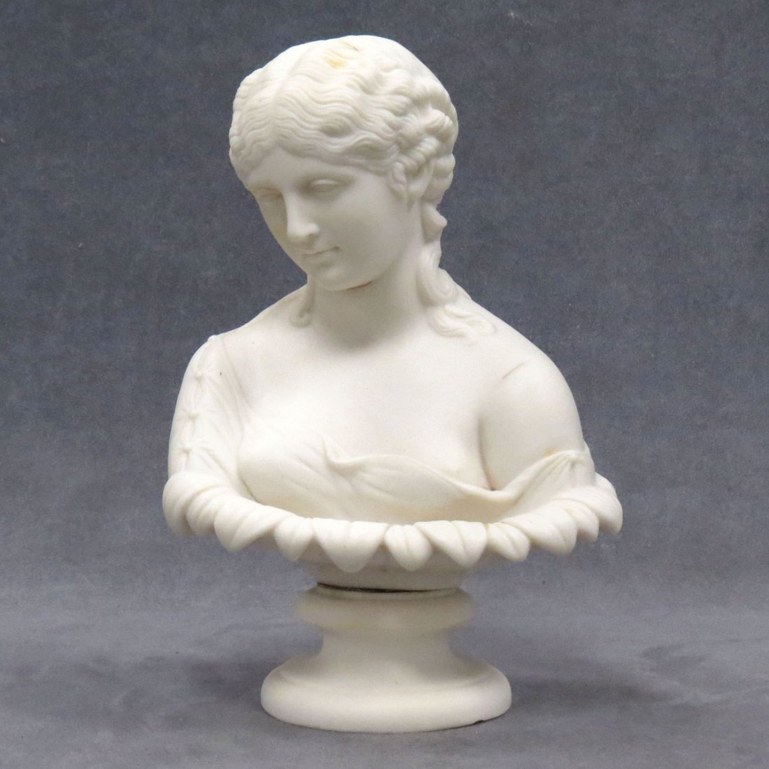 BENNINGTON PARIAN BUST OF A YOUNG WOMAN: BENNINGTON PARIAN BUST OF A YOUNG WOMAN, 19TH CENTURY. HEIGHT 9 1/2"
