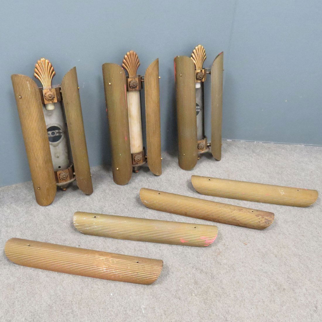 PAIR ART DECO BRASS FROSTED GLASS WALL SCONCES: PAIR ART DECO BRASS FROSTED GLASS WALL SCONCES, C.1912. HEIGHT 24"; WIDTH 10" (REMOVED FROM THE LOEW'S DELANCEY THEATER, 140-146 DELANCY ST., NEW YORK) MISSING (2) FROSTED GLASS PANELS