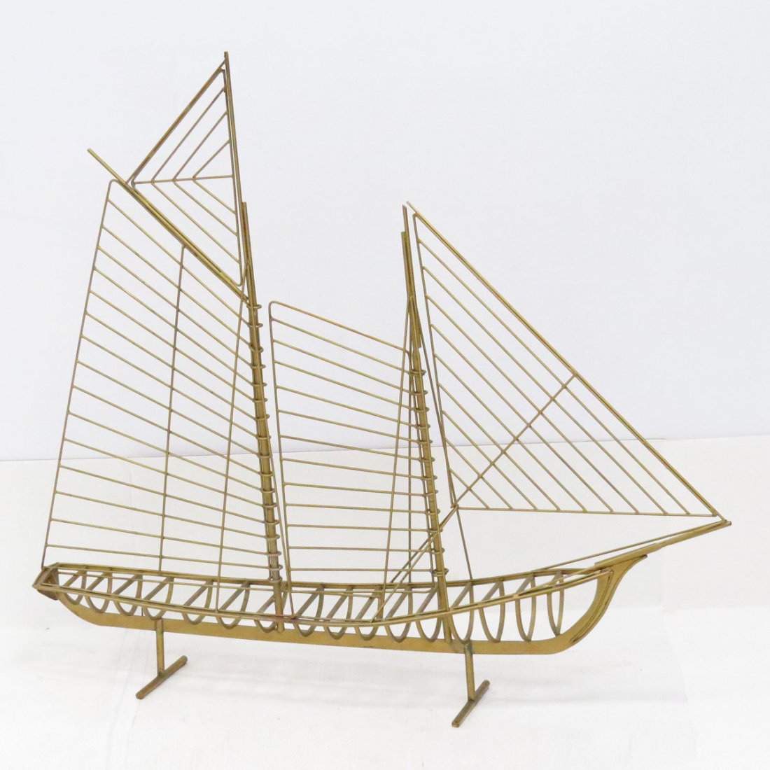 WROUGHT AND GILT METAL SAIL BOAT MODEL: WROUGHT AND GILT METAL SAIL BOAT MODEL. HEIGHT 41"; LENGTH 46"
