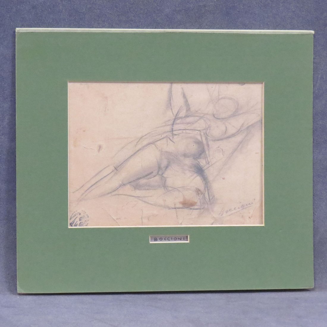 ATTRIBUTED TO UMBERTO BOCCIONI (ITALIAN 1882-1916): ATTRIBUTED TO UMBERTO BOCCIONI (ITALIAN 1882-1916), GRAPHITE, RECLINING NUDE, SIGNED AND ARTIST STAMP. SHEET 5 3/4 X 7 7/8" (LAID DOWN)