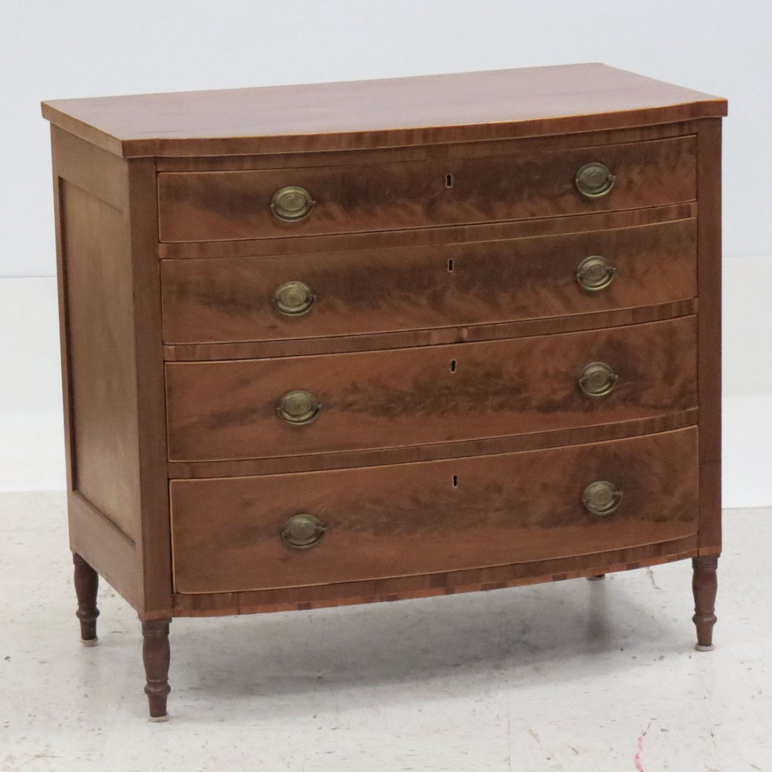 SHERATON CHERRY AND BURL BOW FRONT CHEST: SHERATON CARVED AND INLAID CHERRY AND BURL BOW FRONT CHEST, C.1810. HEIGHT 36"; WIDTH 39"
