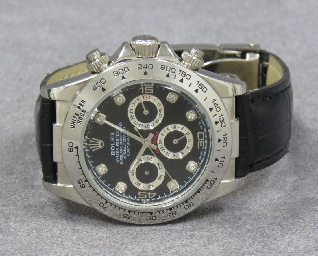 REPLICA: ROLEX STAINLESS DAYTONA WRISTWATCH: REPLICA: ROLEX STAINLESS DAYTONA AUTOMATIC WRISTWATCH. 40MM