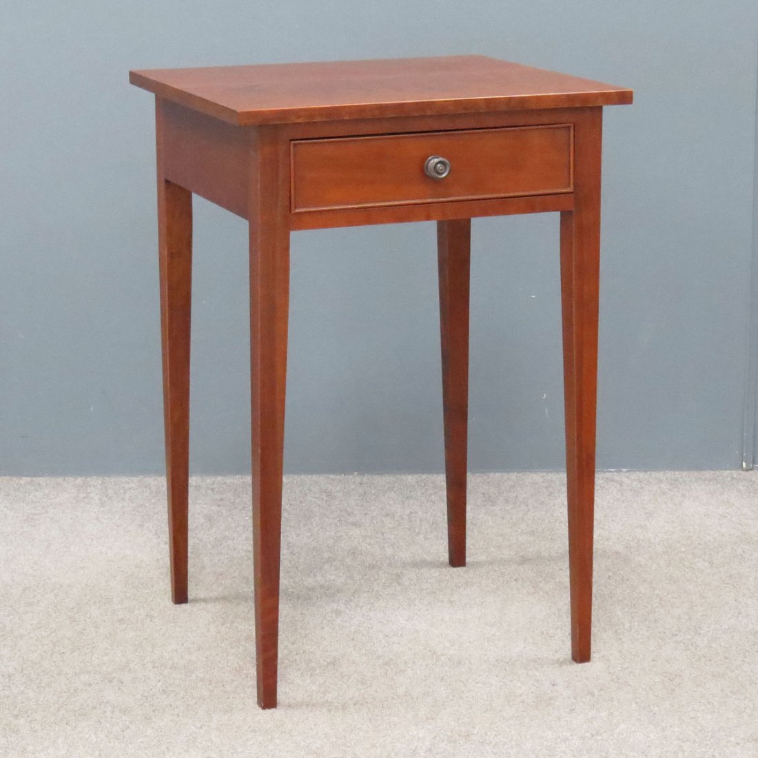ELDRED WHEELER HEPPLEWHITE CHERRY STAND: ELDRED WHEELER HEPPLEWHITE CHERRY SINGLE DRAWER STAND. HEIGHT 27 1/2"