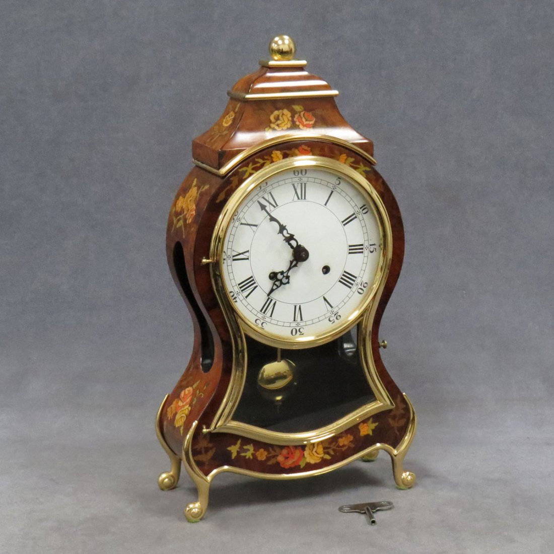 FRENCH STYLE BURL INLAID SHELF CLOCK: FRENCH STYLE BURL INLAID SHELF CLOCK. HEIGHT 17"