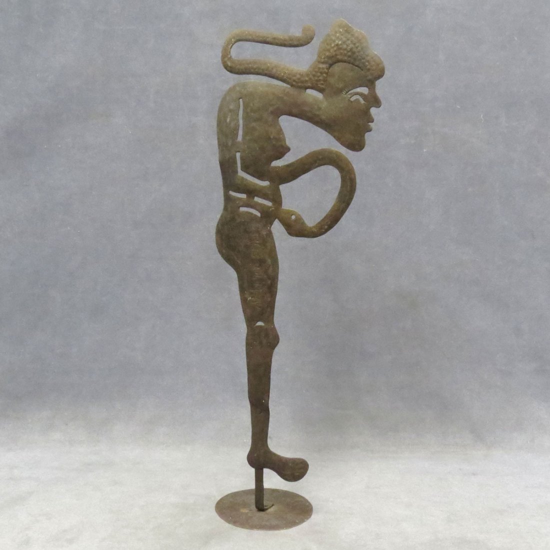 SERGE JOLINEAU (HAITIAN 1952-), RECYCLED STEEL: SERGE JOLINEAU (HAITIAN 1952-), RECYCLED STEEL DRUM, MALE FIGURE WITH SNAKE, SIGNED. HEIGHT 25 1/4"