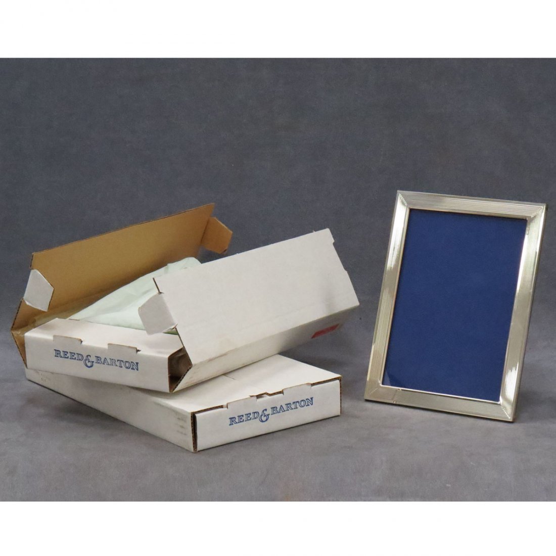 PAIR REED AND BARTON STERLING SILVER FRAMES: PAIR REED AND BARTON STERLING SILVER FRAMES. 5 X 7"