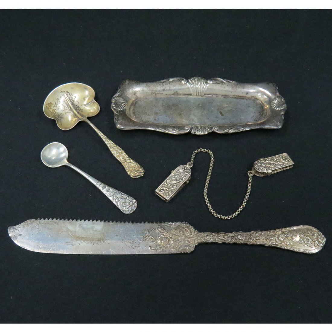 LOT ASSORTED STERLING INCLUDING PIN TRAY: LOT ASSORTED STERLING INCLUDING PIN TRAY, FISH KNIFE, SALT SPOON, BON BON, SWEATER CLIPS. TWT 5.21 OZT