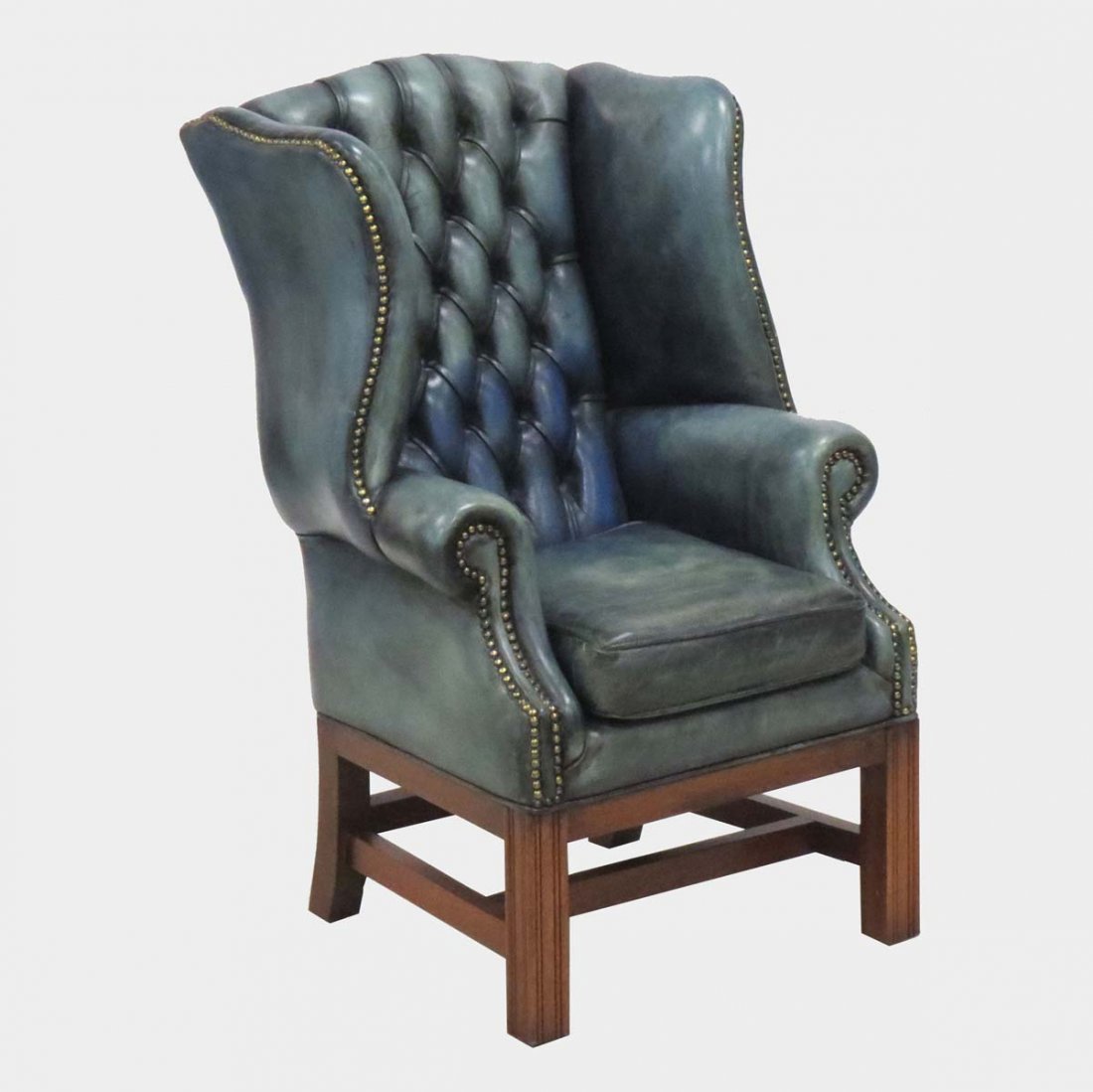 CHIPPENDALE STYLE LEATHER WING-BACK ARMCHAIR: CHIPPENDALE STYLE LEATHER UPHOLSTERED WING-BACK ARMCHAIR. HEIGHT 36"; WIDTH 23"; DEPTH 26"