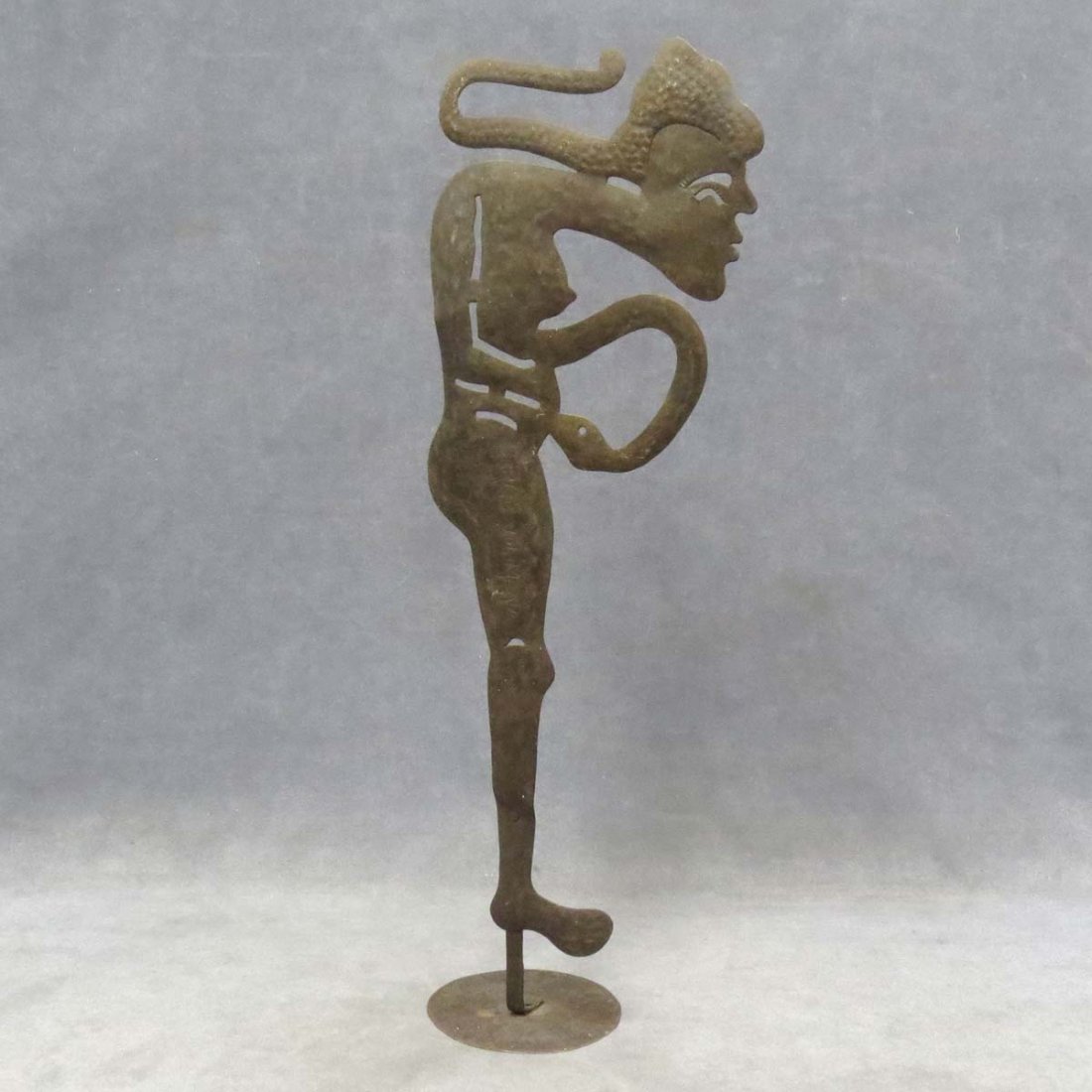 SERGE JOLINEAU (HAITIAN 1952-) FIGURE: SERGE JOLINEAU (HAITIAN 1952-), RECYCLED STEEL DRUM, MALE FIGURE WITH SNAKE, SIGNED. HEIGHT 25 1/4"