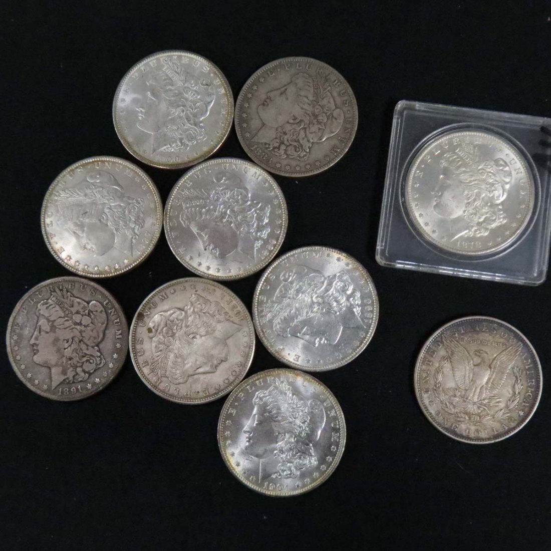 LOT (10) ASSORTED MORGAN SILVER DOLLAR COINS: LOT (10) ASSORTED MORGAN SILVER DOLLAR COINS
