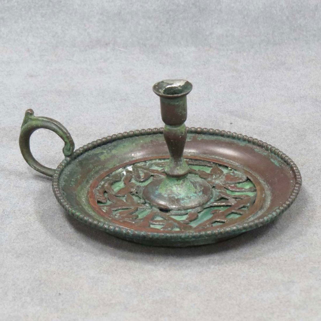 APOLLO STUDIO'S/NEW YORK PATINATED BRONZE TAPER: APOLLO STUDIO'S/NEW YORK PATINATED BRONZE TAPER STICK HOLDER, SIGNED #159. DIAMETER 4"