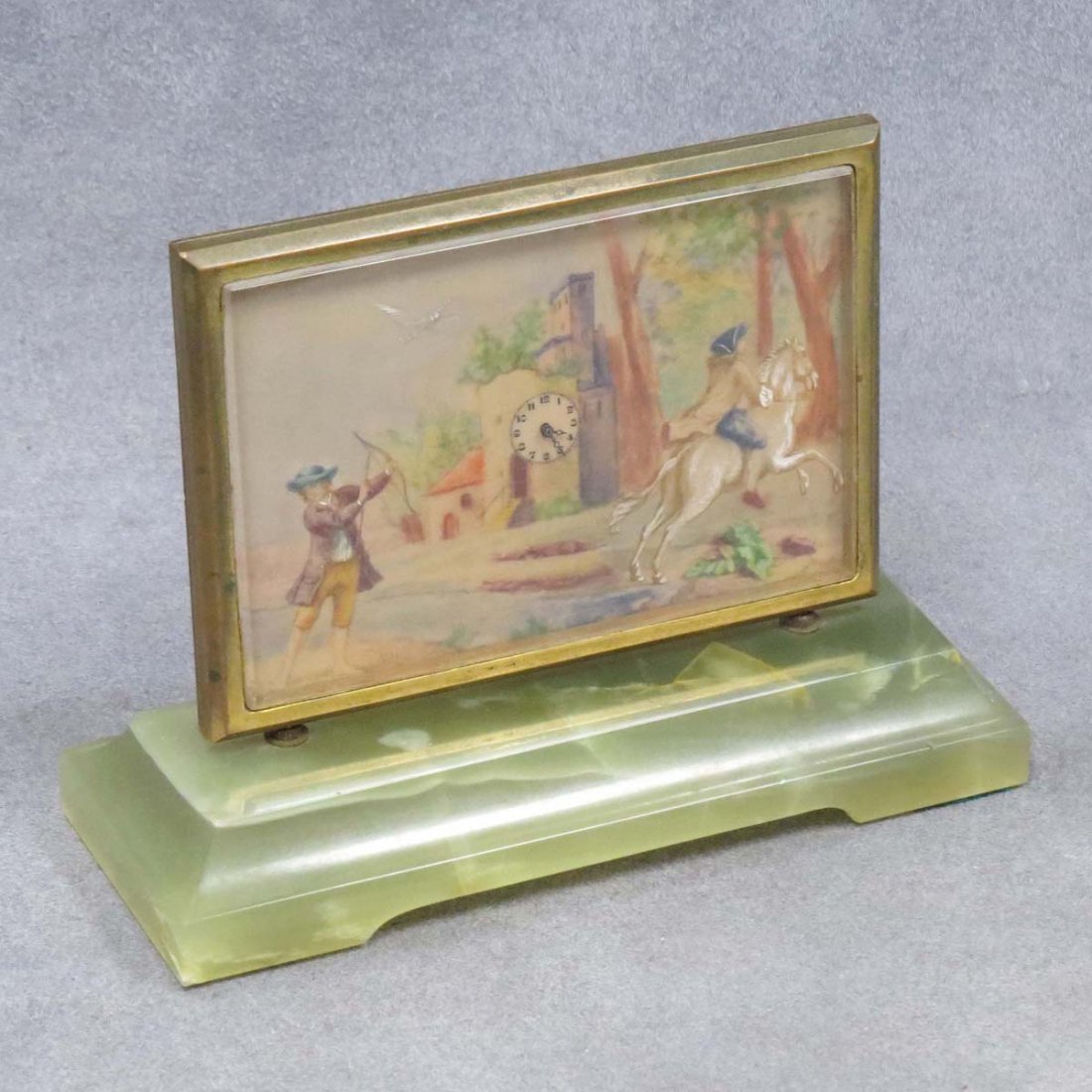 VINTAGE HAND DECORATED BRASS AND ONYX CLOCK: VINTAGE HAND DECORATED BRASS AND ONYX PICTURE DESK CLOCK. HEIGHT 4 1/2"; WIDTH 6"