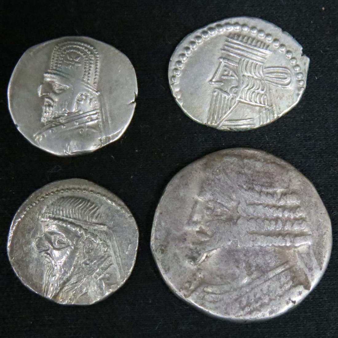 PARTHIAN KINGDOM; LOT (4) INCLUDING MITHRADATES II: PARTHIAN KINGDOM; LOT (4) INCLUDING MITHRADATES II; AR DRACHM, 123-88BC; ORODES I; AR DRACHM, 90-77BC (SHORE 122); ARTABANOS II; AR TETRADRACHM, 10-40AD (SHORE 330); VOLOGASES III; AR DRACHM, 105-147A