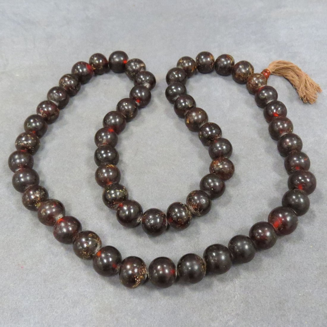 NEPALESE AMBER PRAYER BEADS: NEPALESE AMBER PRAYER BEADS. LENGTH 44"