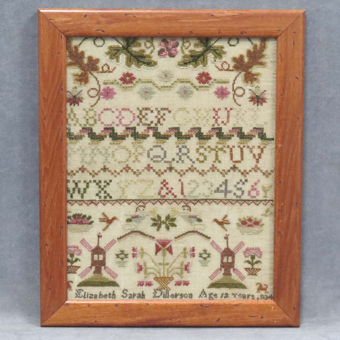 NEEDLEPOINT SAMPLER, WOOL AND COTTON ON LINEN: NEEDLEPOINT SAMPLER, WOOL AND COTTON ON LINEN, ELIZABETH SARAH DILLERSON AGE 12 YEARS, 1834. 14 X 11"; FRAMED AND GLAZED-17 X 14"
