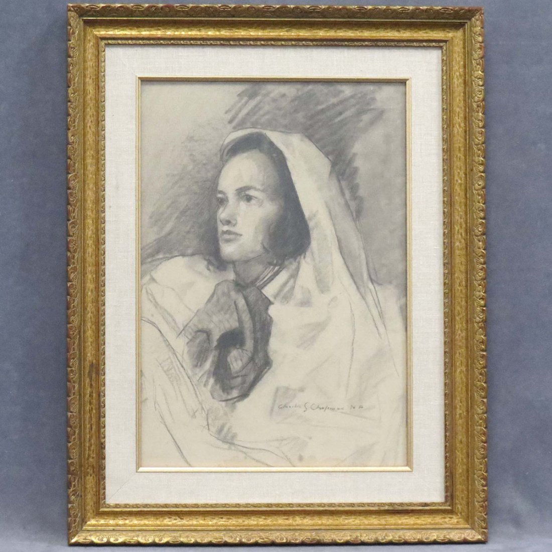 CHARLES SHEPARD CHAPMAN N.A. (AMERICAN 1879-1962): CHARLES SHEPARD CHAPMAN N.A. (AMERICAN 1879-1962), CHARCOAL ILLUSTRATION, YOUNG WOMAN WITH CLOAK, SIGNED. SIGHT 19 X 13"; FRAMED AND GLAZED-27 X 21"