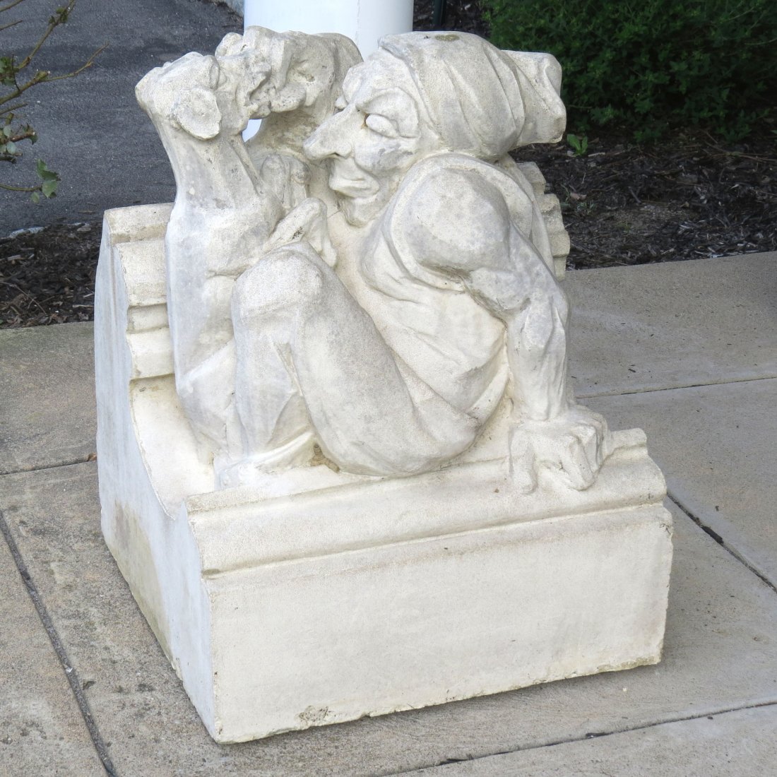 GOTHIC STYLE CAST STONE ARCHITECTURAL GROTESQUE: GOTHIC STYLE CAST STONE ARCHITECTURAL GROTESQUE OF MAN AND DOG. HEIGHT 29"