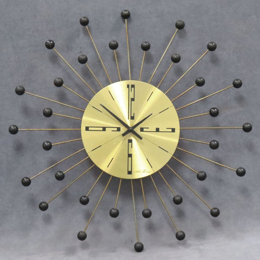 VINTAGE SETH THOMAS STAR BURST WALL CLOCK: VINTAGE SETH THOMAS STAR BURST WALL CLOCK. DIAMETER 22"