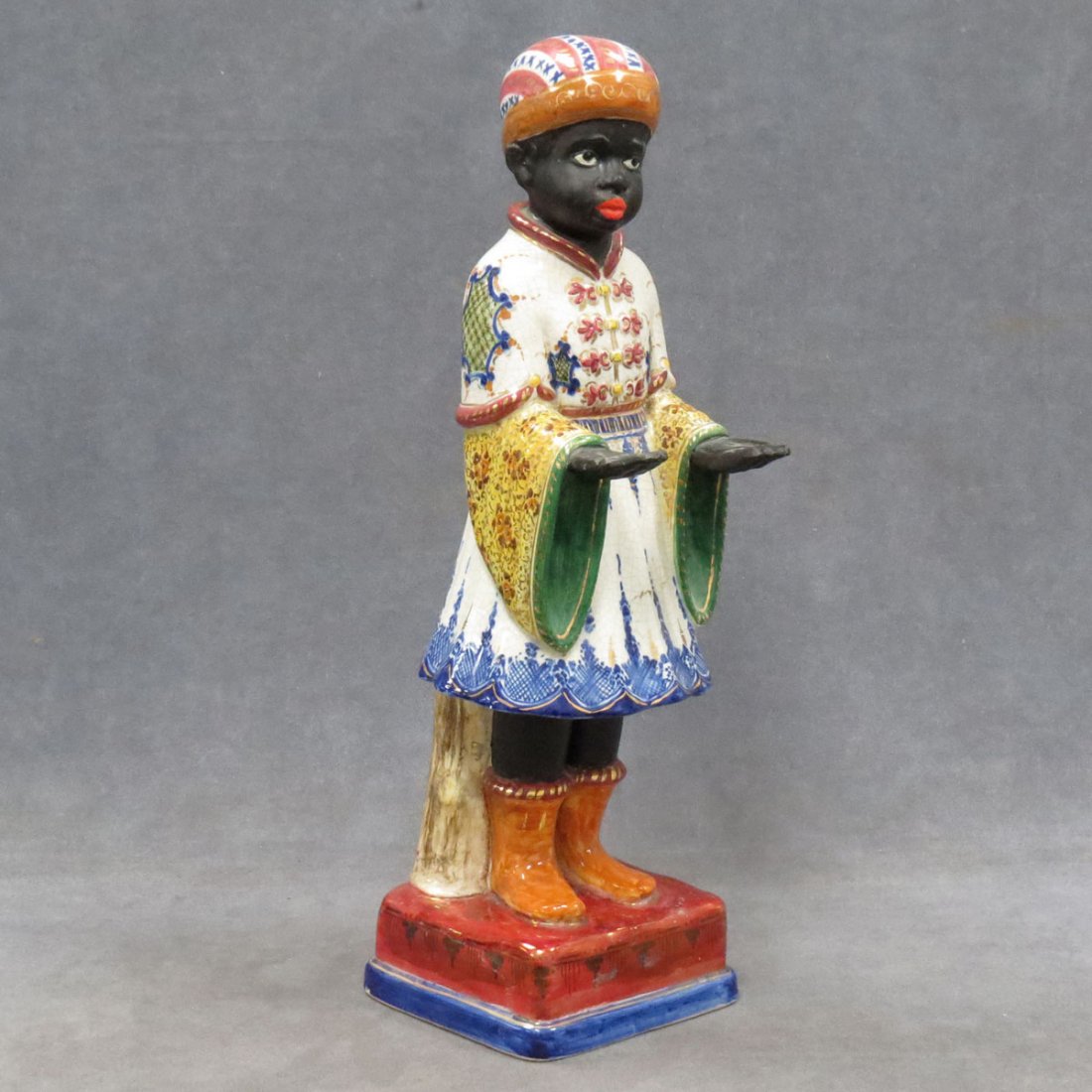FAIENCE POTTERY DECORATED BLACKAMOOR FIGURE: FAIENCE POTTERY DECORATED BLACKAMOOR FIGURE. HEIGHT 18"