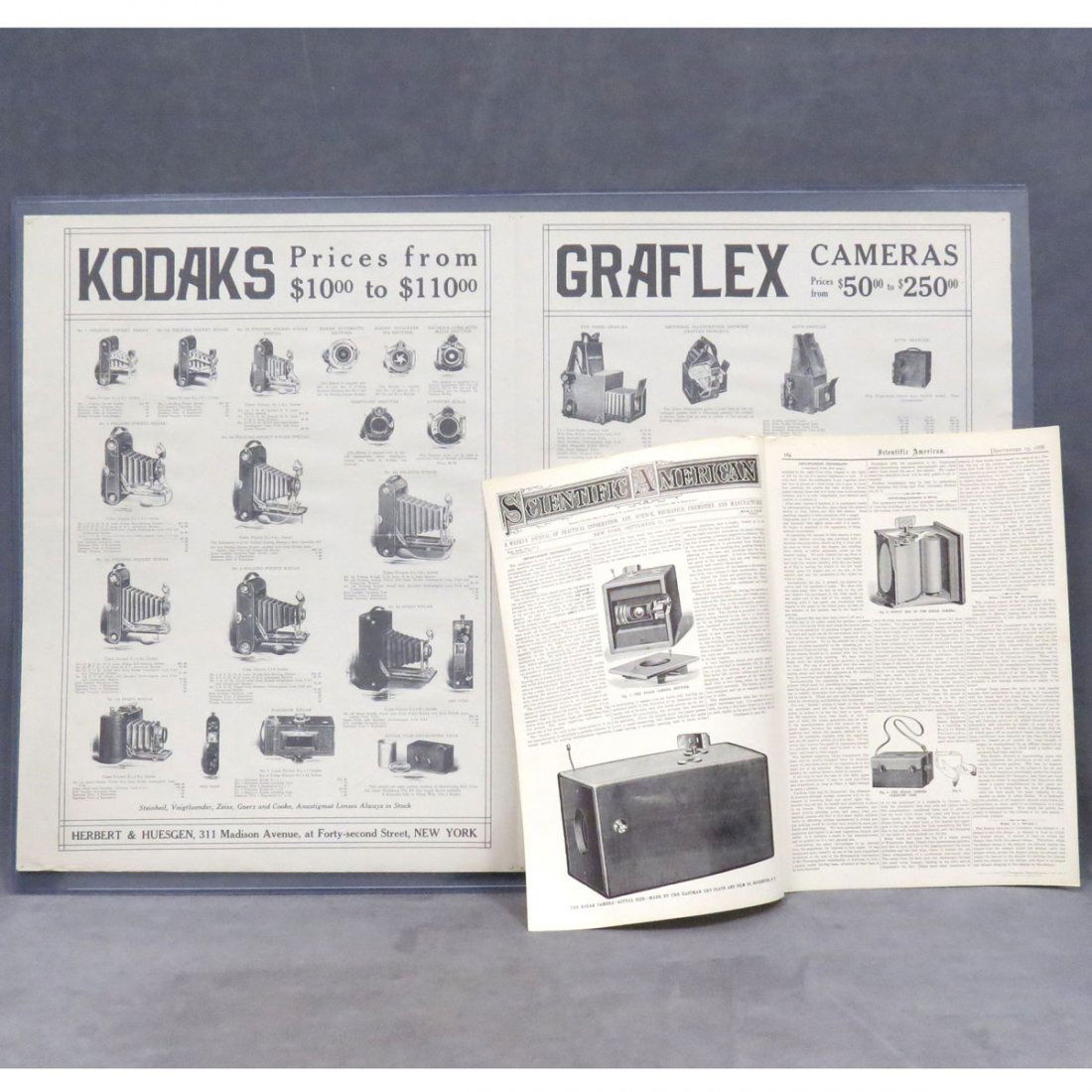 LOT (2) PHOTOGRAPHIC EPHEMERA INCLUDING KODAK & GRAFLEX: LOT (2) PHOTOGRAPHIC EPHEMERA FROM THE PHOTOGRAPHIC HISTORICAL SOCIETY INCLUDING CAMERA RETAILER'SKODAK AND GRAFLEX ADVERTISING BROADSIDE , 23 X 35" AND SCIENTIFIC AMERICAN-KODAK INSTANTANEOUS PHOTOGR