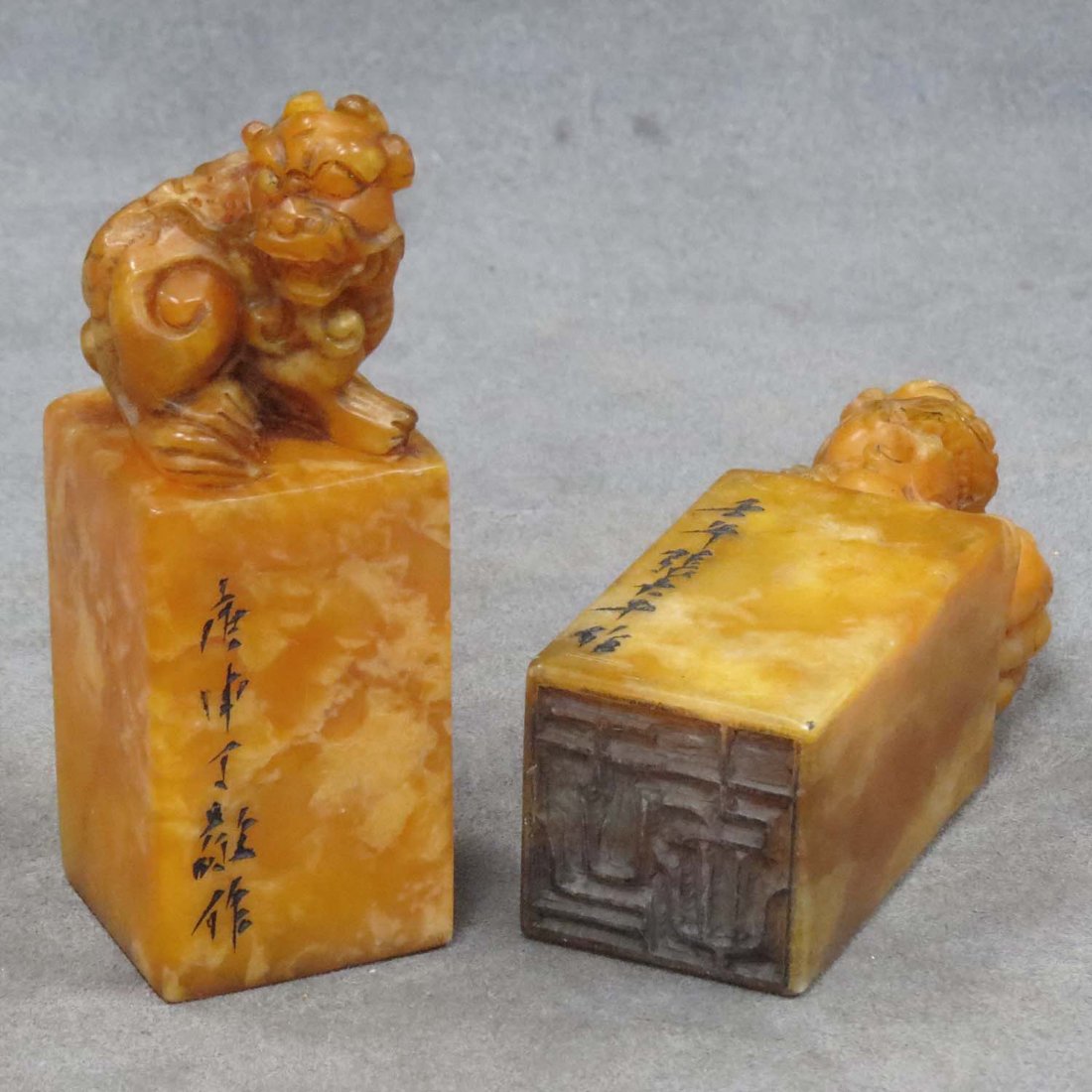 PAIR CHINESE CARVED SOAPSTONE SEALS: PAIR CHINESE CARVED SOAPSTONE SEALS. HEIGHT 4 1/2"
