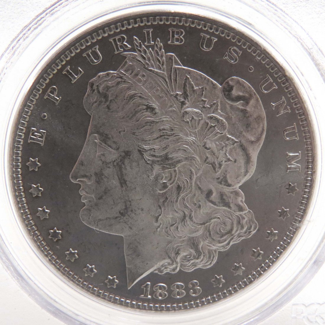 MORGAN 1883 SILVER DOLLAR: MORGAN 1883 SILVER DOLLAR, (MS63)