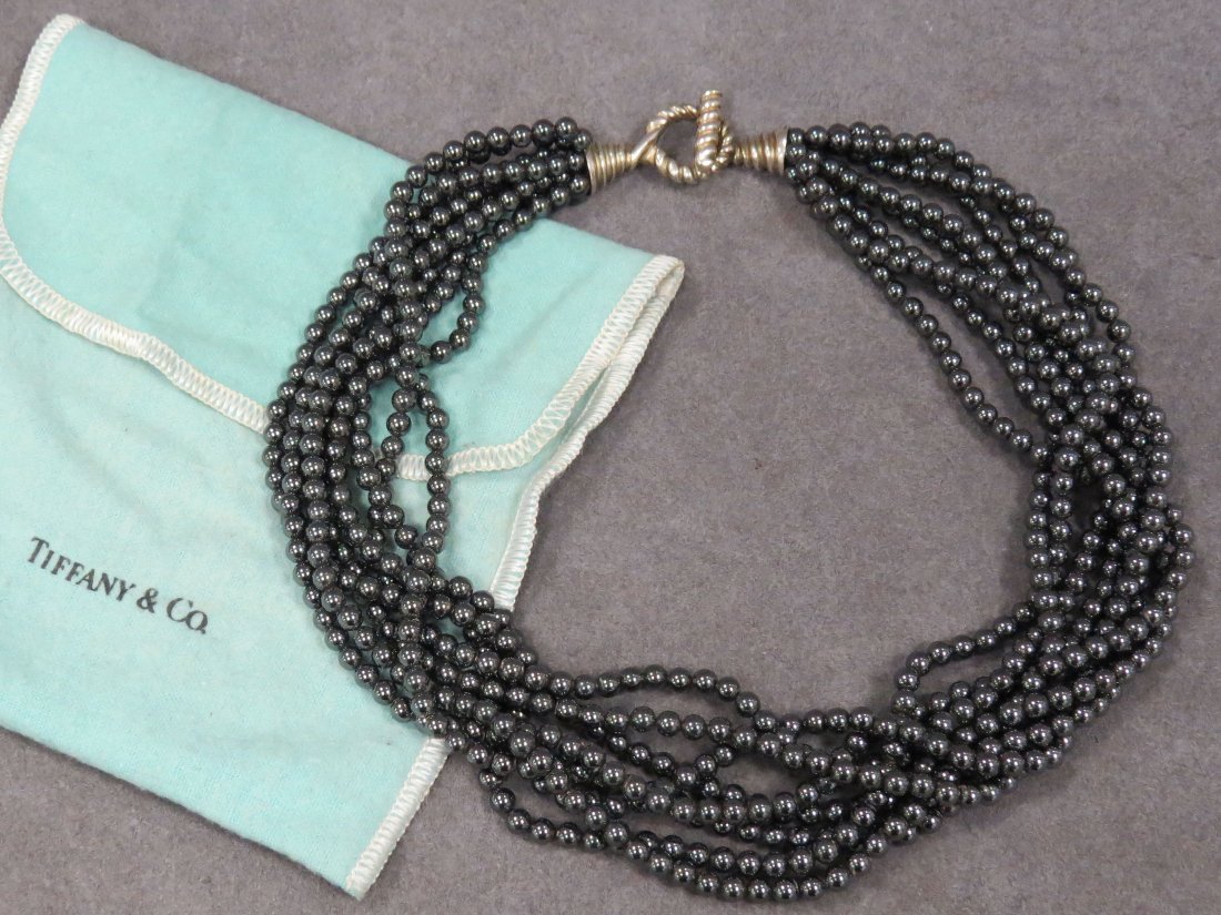 TIFFANY & CO. TORSADE HEMATITE NECKLACE: TIFFANY & CO. TORSADE HEMATITE NECKLACE WITH STERLING CLASP, SIGNED. LENGTH 16"