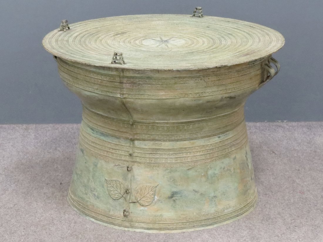 THAI BRONZE DRUM/TABLE: THAI BRONZE DRUM/TABLE. HEIGHT 17"; DIAMETER 24"