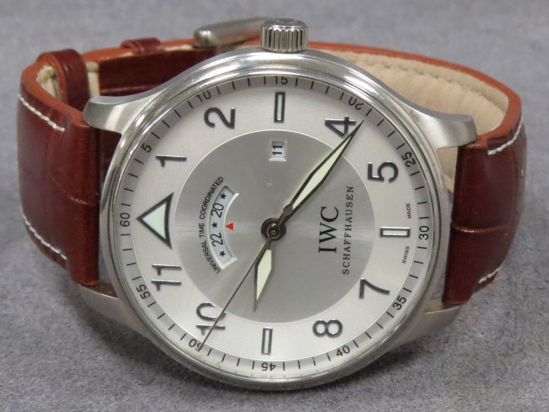 REPLICA IWC STAINLESS AUTOMATIC WRISTWATCH: REPLICA IWC STAINLESS UNIVERSAL TIME/CALENDAR AUTOMATIC WRISTWATCH. 45MM